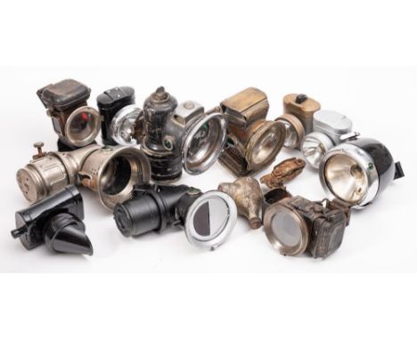A collection of vintage bicycle lamps: various makers including a Lucas 'New Holophote' and others. 