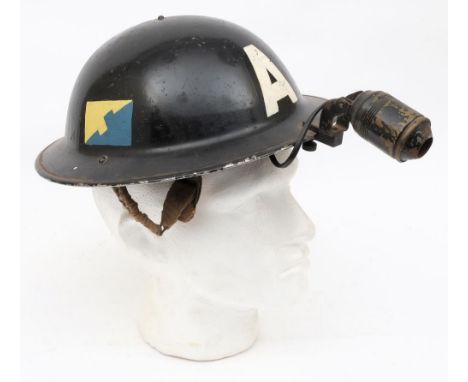 A WWII Mk II 2A pattern Ambulance Driver/Attendant steel helmet with brass lamp: the black helmet with white 'A' to front and
