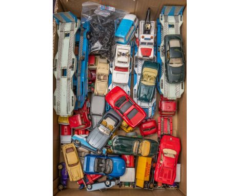 Dinky, Corgi and others. A collection of loose playworn vehicles: including a Ferrari 280GTO, a Police Range Rover and others