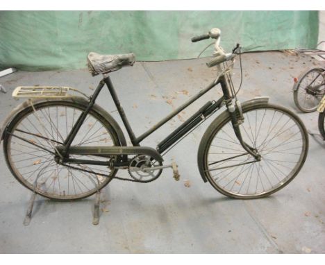 A New Hudson lady's bicycle: black step through frame with plated handlebars, bar brakes, Sturmey Archer three speed gears, c