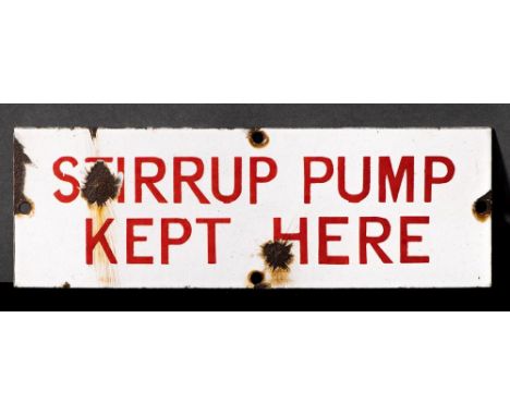 A WWII enamel door sign 'Stirrup Pump Kept Here': red text on white ground, 7.6 x 22.7cm