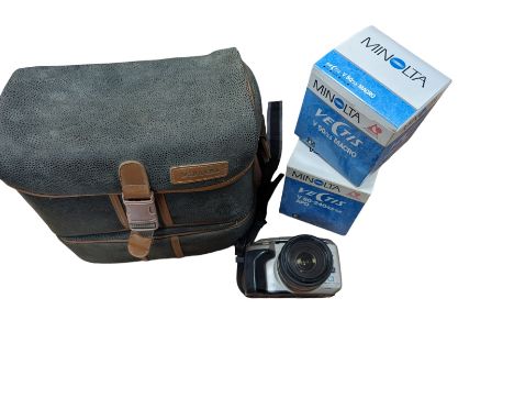 Minolta Vectis S-1 camera body serial no. 98608855, with a 22-80mm 1:4 (22)-5.6 lens, together with a collection of Minolta V