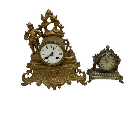 19th century French mantle clock in a spelter case and a 20th century spring driven alarm clock