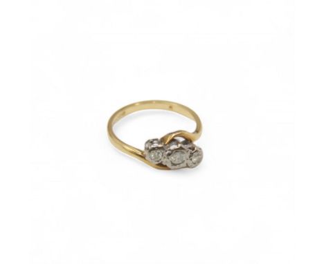 18ct gold three stone diamond ring, hallmarked Condition Report:Approx 2.83 grams, size M, central diamond loose