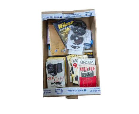 Camera reference books, user guides, instruction manuals, etc, mostly for Nikon and Minolta cameras