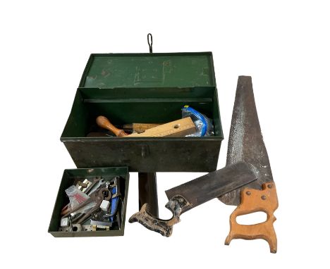 Green tin box of tools, including saws, spanners etc