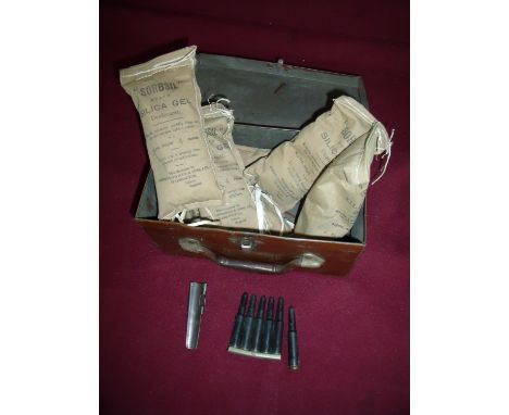 Rectangular tin with a small selection of dummy rounds, various tools and WWII period Sorbsil silica gel bags 