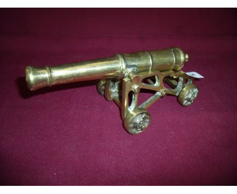 Brass scale model of a cannon on carriage, length of barrel 9 inches 