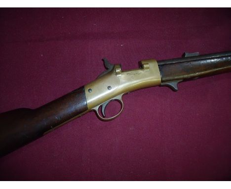 Greene Rifle Works Worcester Mass rolling block carbine rifle (lacking block), with 20 inch barrel and brass action stamped w