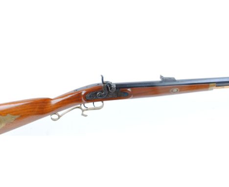 .45 Percussion rifle by Thompson Centre Arms, USA, 29 ins octagonal half stocked barrel, blade and ramp sights, brass mounted