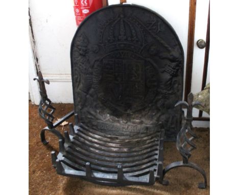 A 19th century fire grate with solid fire back