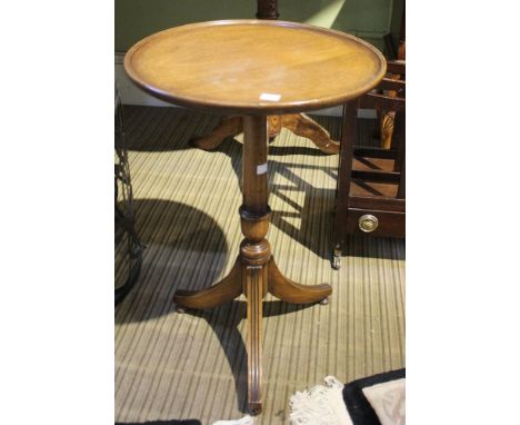 Circular topped tripod lamp or wine table on reeded tripod legs Condition: Some scratches, fading of use and time, small dent