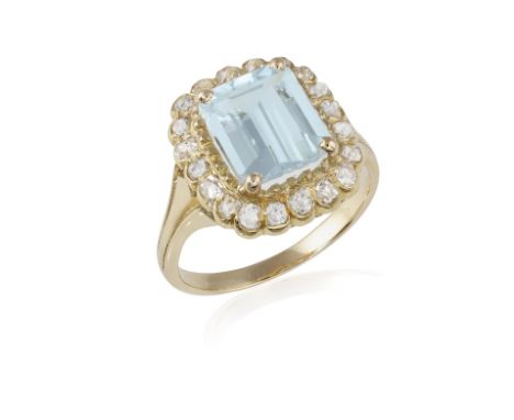 AN AQUAMARINE AND DIAMOND CLUSTER RING, composed of a central rectangular-cut aquamarine within a surround of old single and 