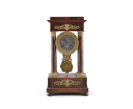 A FRENCH MAHOGANY AND GILTMETAL MOUNTED 'EMPIRE' MANTLE CLOCK, 19th century of architectural form, with gilded and silver dia