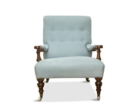 A VICTORIAN WALNUT AND BUTTON UPHOLSTER ARMCHAIR, 19th century, covered in soft blue fabric, with padded armrests, stuffed se