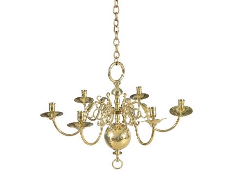 A DUTCH BRASS SIX BRANCH CEILING LIGHT, with scroll arm branches and raised sockets, issued from a bulbous and vase shaped ce