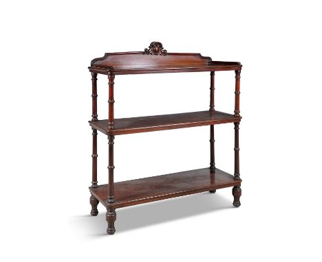 A VICTORIAN MAHOGANY RECTANGULAR THREE TIER DUMB WAITER, with raised panel back, raised on turned banded columns on turned fe