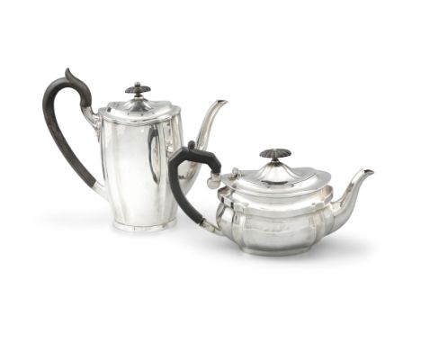 AN EDWARDIAN SILVER HOT WATER POT, Sheffield c.1919, mark of William Hutton & Sons Ltd., of plain upright form, the hinged co