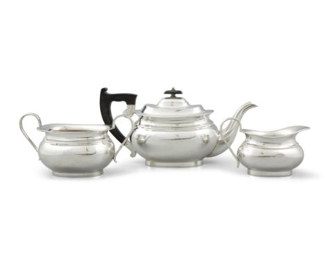 A SILVER THREE PIECE OVAL TEA SERVICE, Sheffield, c.1949, mark of Edwin Viner, comprising a teapot, sugar bowl and creamer, o