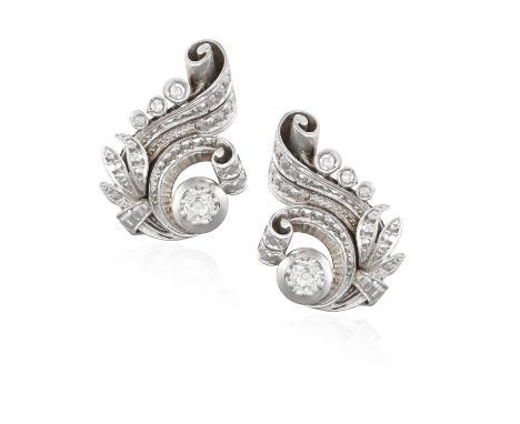 A PAIR OF DIAMOND EARCLIPS CIRCA 1960, of foliate design set with old brilliant and single-cut diamonds, mounted in 18K gold,