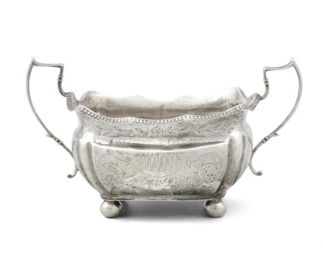 A CORK PROVINCIAL SILVER TWIN HANDLED SUGAR BOWL, stamped 'STERLING' twice to the base, the body with bright-cut decoration, 