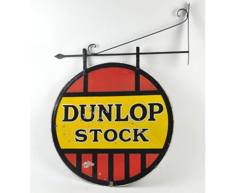 Original Dunlop stock enamel sign, double sided and on wall hanging bracket, sign diameter 61cm. 