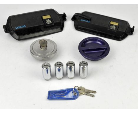 Ford Escort - Two Lucas lamp covers, Two fuel caps off Ford Escort (1 with lock and key), four wheel locking bolts with 2 key