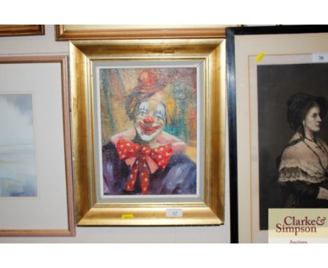 A gilt framed oil on canvas portrait study of a clown signed bottom right