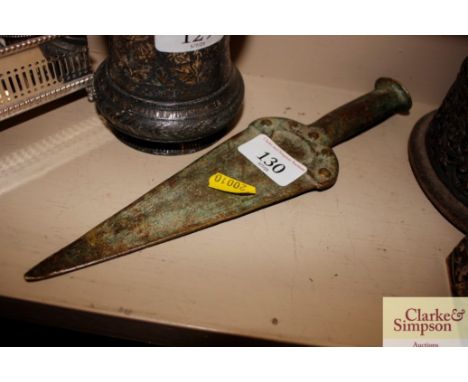 An antique bronze hand spear