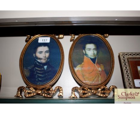 A pair of miniature portrait prints in decorative gilt frames 
