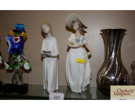 A Nao figurine and a Lladro figurine