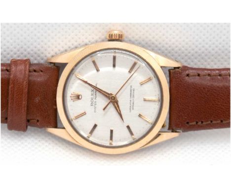 Herrenarmbanduhr/Chronometer "Rolex Oyster Perpetual", vergoldetes Edelstahlgehäuse, silberfarbenes Ziffernblatt mit goldenen