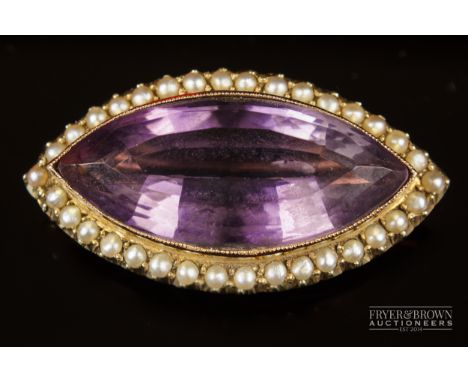 A 15ct gold antique amethyst and split pearl brooch, c1880, the marquise shaped mixed cut amethyst within a surround of split