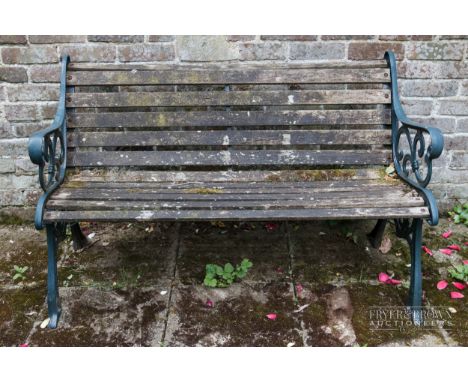 A metal framed garden bench