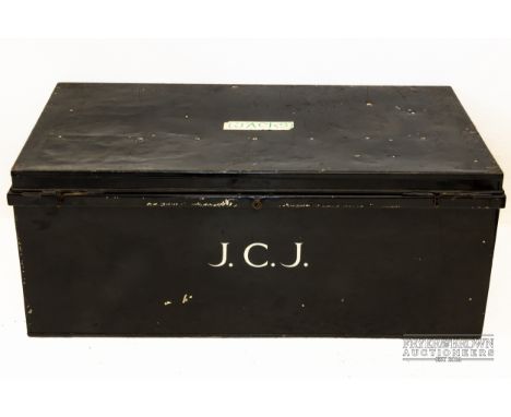 A large metal school trunk