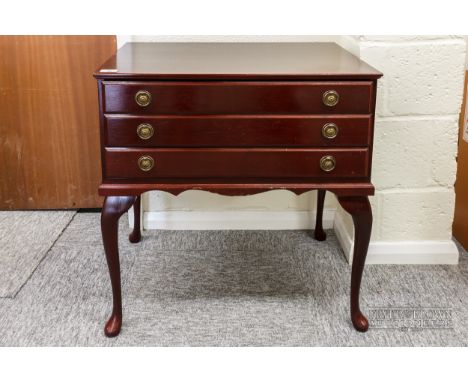 A canteen of Pinder Brothers silver plated Kings pattern cutlery, twelve place setting, in a mahogany finish three drawer mod