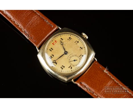 A vintage 9ct gold Longines cushion shaped gentleman's wrist watch, c1930, the Champagne coloured dial with black enamel and 