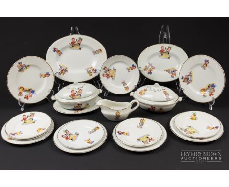 A child's miniature dinner service, decorated in Mabel Lucy Attwell style with children playing, gilt rims, comprising gravy 
