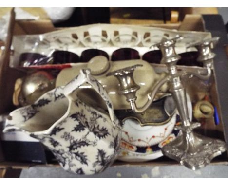 A good mixed lot of collectables to include a silver plated candlestick, a stone hot water bottle, brassware, a ceramic jug a