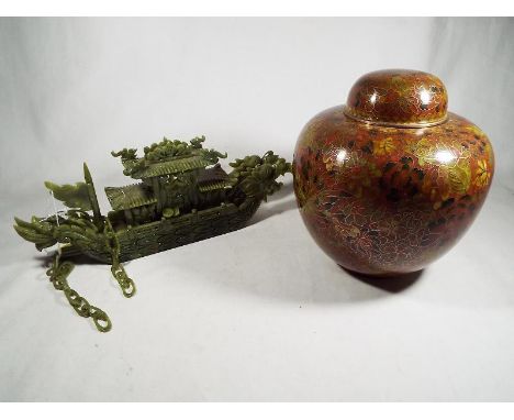 A good quality cloisonne covered ginger jar, 18 cm (high) and a carved hardstone depiction of a boat with fu dragon detail, 1