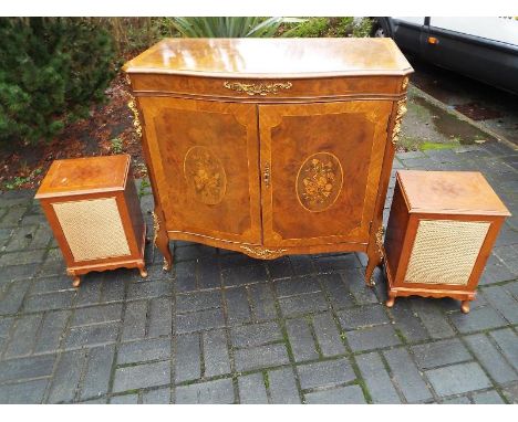 A music cabinet and a matched pair of speaker cabinets in walnut veneer cases and cabriole supports