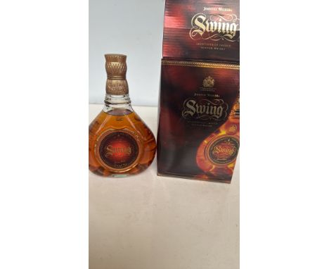 Johnnie Walker Swing Scotch Whisky, 750ml, in signature rocking bottle with original box.