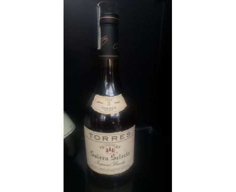 Lot of two vintage spirits: Torres Solera Selecta Imperial Brandy VSOP and Freezomint de Cusenier CrÃ¨me de Menthe. Both sele