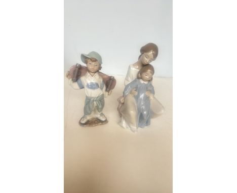 Set of Nao by Lladro porcelain figurines, made in Spain. Elegant glazed finish with delicate detailing, marked to the base.