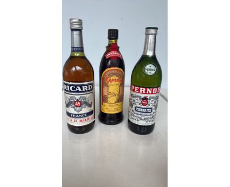 Lot of three vintage liqueurs: Ricard Pastis de Marseille, KahlÃºa coffee liqueur, and Pernod Fils anise spirit