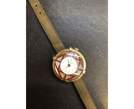 Vintage Swiss A M pocket watch on a vintage rolled  gold fob watch holder 