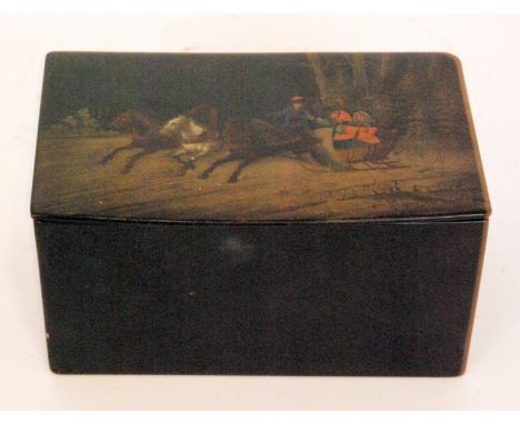 A late 19th Century Russian black lacquer tea caddy with hinged lift lid decorated with figures riding a horse drawn troika i