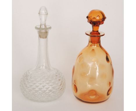 A 1930s Thomas Webb & Sons Tudor pattern decanter of ovoid form with spherical stopper, relief moulded with repeat bulls eye 