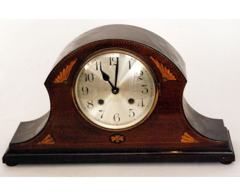 A 1930s marquetry inlaid mahogany eight day mantle clock, silvered dial and eight day striking movement, width 43cm