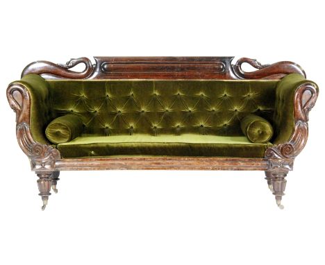 A late 19th Century French Empire style sofa, the exposed mahogany frame with twin swan neck capitals above turned feet with 